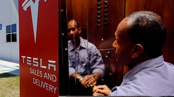 லிஃப்ட் ஊழியர்களுக்கு 1,000 கோடி ரூபாய் இழப்பீடு வழங்கும் TESLA நிறுவனம் : என்ன நடந்தது?