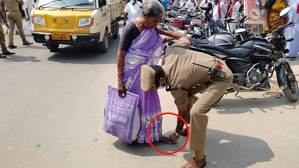 தடுமாறிய மூதாட்டி.. தோள் கொடுத்து காலணி அணிவித்த டி.எஸ்.பி. - குடியாத்தம் நகராட்சியில் நெகிழ்ச்சி!