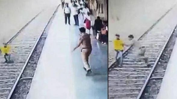 ரயில் முன் பாய்ந்து இளைஞர் தற்கொலை முயற்சி.. தன் உயிரையும் பொருட்படுத்தாமல் காப்பாற்றிய போலிஸ்! (video)