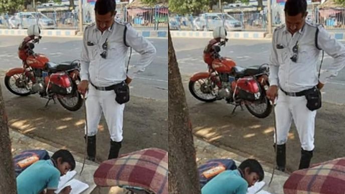 சாலையோர சிறுவனுக்கு ஆசிரியராக மாறிய போக்குவரத்து போலிஸ்.. வைரல் புகைப்படத்தின் பின்னணி?