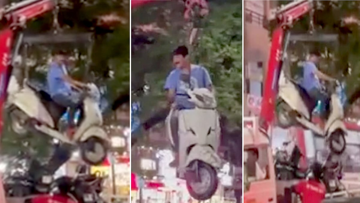 No Parking-ல் நிறுத்தப்பட்ட வாகனம் : உரிமையாளருடன் அலேக்காக கிரேனில் தூக்கிய போலிஸ்! - வைரலாகும் வீடியோ !