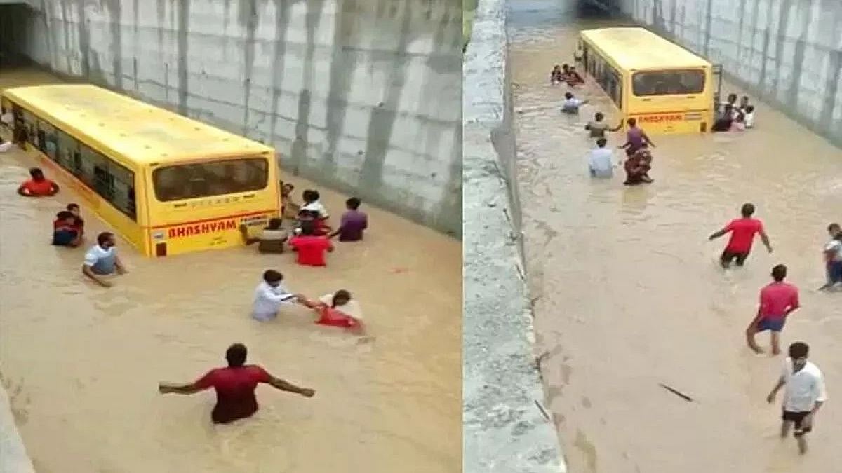 சுரங்கப்பாதை நீரில் சிக்கிய பள்ளி பேருந்து.. மாணவர்களை துரிதமாக மீட்ட பொதுமக்கள் - பெருகும் பாராட்டு! 