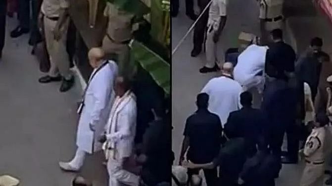 அமித்ஷா செருப்பை கையால் எடுத்துக் கொடுத்த தெலங்கானா பாஜக தலைவர்.. வலுக்கும் கண்டனம்: அதிர்ச்சி வீடியோ!