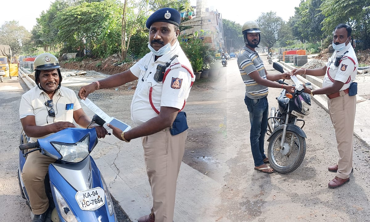 ஹெல்மெட் விதிகளை மீறிய போலிஸ்கள்.. அபராதம் விதித்த சக போலிஸ்.. இணையத்தில் வைரலாகும் புகைப்படம் !