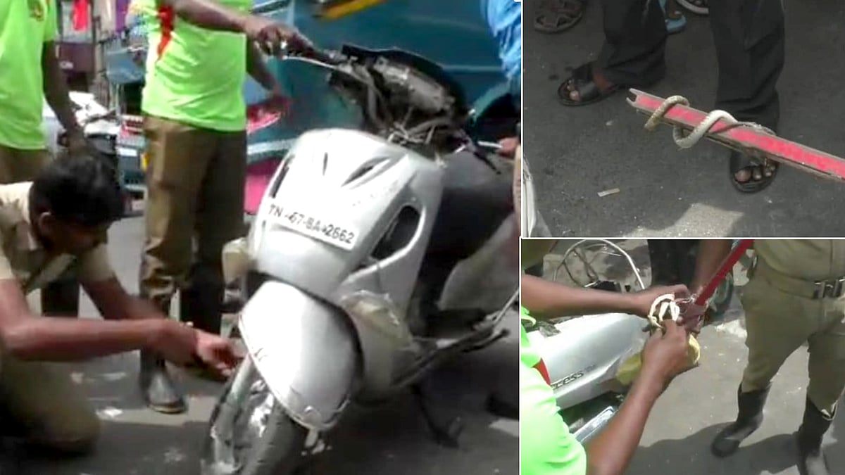 சாலையில் ஓடும் scooty-ல் இருந்து எட்டி பார்த்த பாம்பு.. வண்டியை போட்டுவிட்டு அலறியடித்து ஓடிய பெண்..
