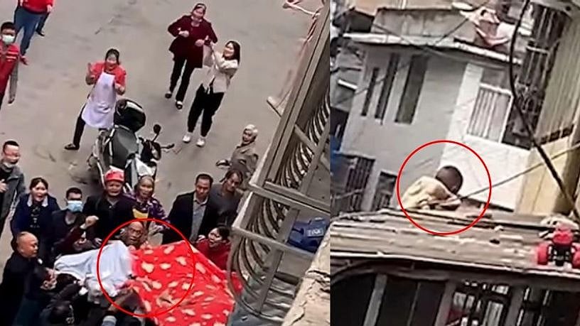 மாடியிலிருந்து தவறி விழுந்த குழந்தை..போர்வையைக் கொண்டு கேட்ச் பிடித்த மக்கள்: வைரலாகும் நெகிழ்ச்சி வீடியோ