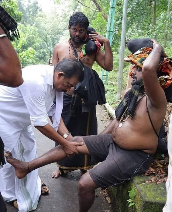 ஐயப்ப பக்தருக்கு தசை பிடிப்பு.. காரில் இருந்து இறங்கி முதலுதவி செய்த  அமைச்சர்.. கேரளாவில் நெகிழ்ச்சி !