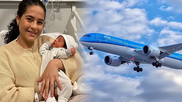பறக்கும் விமானத்தில் கழிவறைக்கு சென்ற இளம்பெண் ஒருவர், கையில் குழந்தையோடு வெளியே வந்தார்