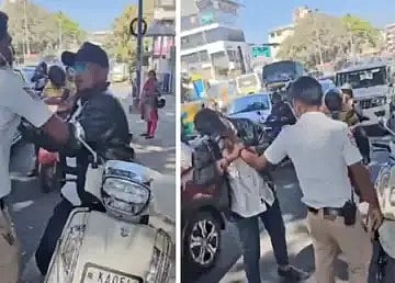 ஹெல்மெட் அணியாமல் வந்ததால் பிடித்த போலிஸ்... கையை கடித்ததால் கம்பி எண்ணும் இளைஞர் - கர்நாடகத்தில் ஷாக் !