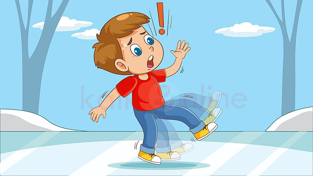 A boy slips on the ice.