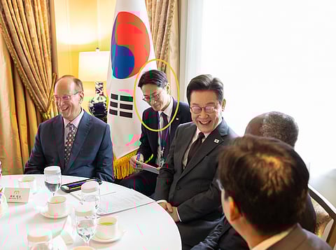 Interpreter Kim Jong-min with President Lee.