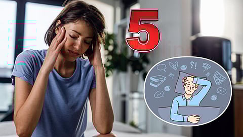 a woman sitting with stress