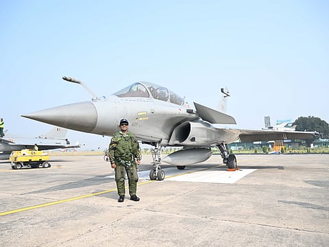 Indian president Droupadi Murmu poses near Indian Air Force Rafale fighter