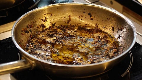 Cleaning a greasy frying pan is easy