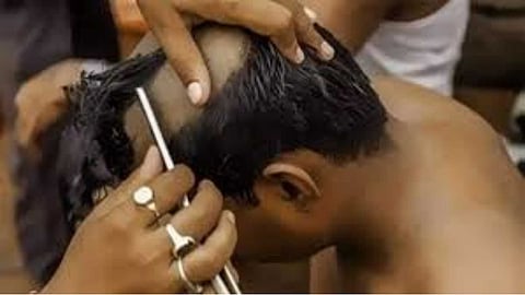 Why is a son's head shaved when his parents die?