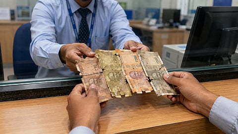 damaged indian currency