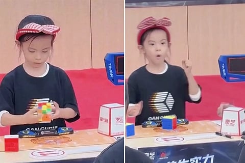 Chinese girl solves Rubik's Cube in 4 seconds