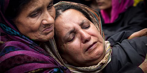 Head of the Association of Parents of Disappeared Persons (APDP), Parveena Ahanger, right, is comforted as she cries during a silent protest organized by the APDP on the International Day of the Disappeared in Srinagar, Kashmir, on August 30, 2013. The image is representational.