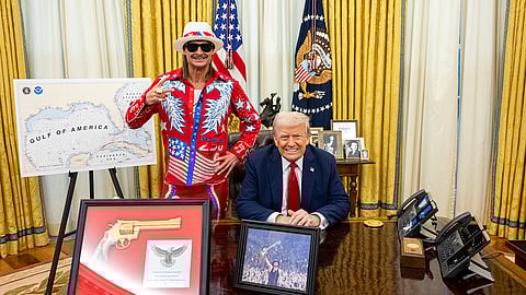 President Trump and singer Kid Rock pose in the Oval Office in front of a map labeled "Gulf of America".
