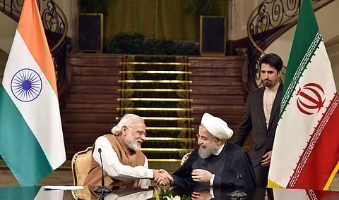 Indian Prime Minister Narendra Modi seated with Iranian President Hassan Rouhani during the joint press statement in Tehran on May 23, 2016.