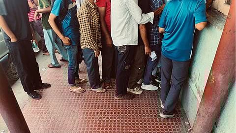 Early morning queue at SMHS Hospital, Srinagar, IMHANS - Substance users wait patiently in line for their medicine.
