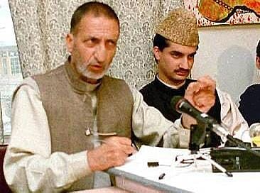 A young Mirwaiz Umar Farooq with Prof Abdul Ghani Bhat during a public event in mid-1990s in Kashmir.