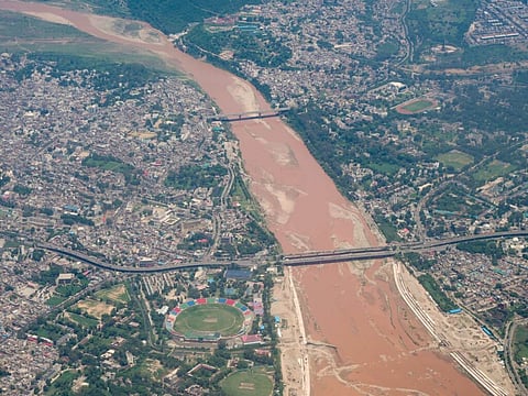 An aerial view of Tawi River that flows through Jammu City in Jammu and Kashmir.