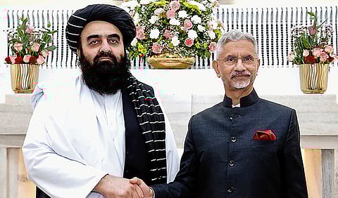 India's Foreign Minister Subrahmanyam Jaishankar (R) and his Afghan counterpart Amir Khan Muttaqi shaking hands during a bilateral meeting in New Delhi, India, on October 10, 2025.