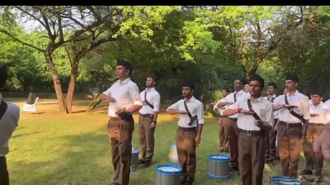 RSS members at a march in JNU on September 28, 2025.