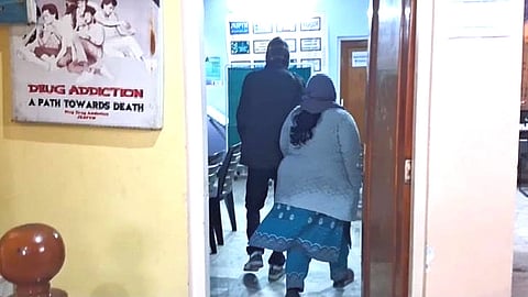 A couple entering a Drug De-addiction Centre in western Jammu in Jammu and Kashmir.