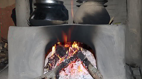 With LPG cylinders becoming expensive and harder to access, some households in Kashmir are turning back to traditional firewood-based cooking methods using a Dambur (Firewood stove).
