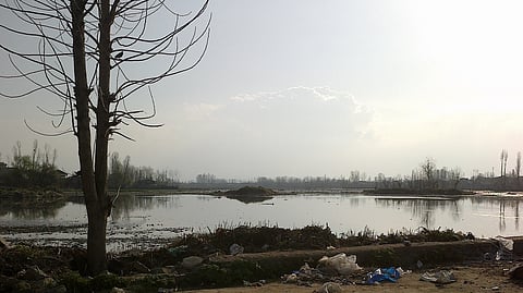 A view of the Khushal Sar from its Northern Shore in Srinagar. It is in a highly deteriorated condition and has been encroached upon at many places with illegal construction and landfilling.
