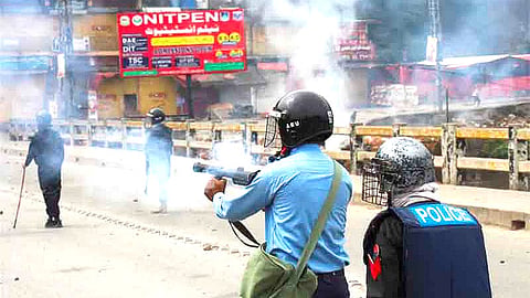 Police firing teargas shells on protestors in Pakistan administered Jammu & Kashmir. Image is representational.