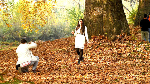 Tourists enjoying autumn, that sets in September and lasts till November end also known as Golden Season when colour of flora turns gold, in Srinagar, Kashmir on Monday, November 13, 2023. Image is representational.