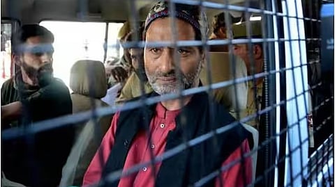 JKLF chairman Yasin Malik being taken to a court by police.