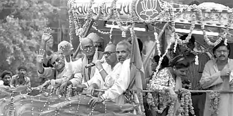File photo of L.K. Advani during his 1990 rath yatra. Also present, Narendra Modi, then an RSS pracharak, now prime minister.