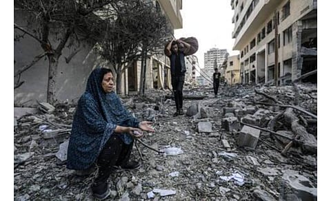 Loss and desperation: As Gaza is turned into a field of blood, gore, bodies and rubble, people go about their routine life and mourn. 