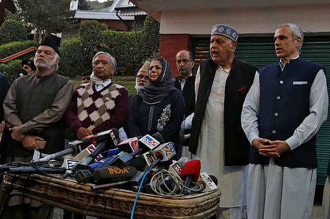 The image is representational. Kashmiri political leaders address the media after their meeting in Srinagar, October 15, 2020 [Danish Ismail/Reuters]
