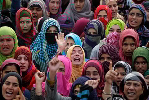 Kashmiri women protesting against Konan-Poshpora mass rapes. Photo/Danish Ismail-Reuters
