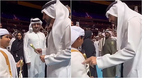 تواضع الكبار.. حمدان بن محمد يقدم لـ "مايد" درساً في العطاء ويُهدي وردته لـ "وزير الأمل"