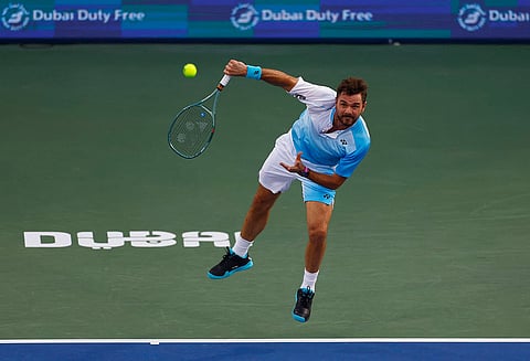 ستان فافرينكا من سويسرا في لقطة خلال مباراته في دور الـ 32 ضد بنيامين حسن من لبنان.