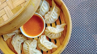 Craving momos in Ahmedabad? Check out THESE 6 local favourite spots you can't miss!