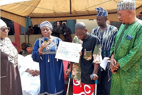 Victim receiving his compensation 