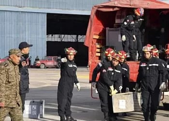 Emergency responders in Tunisia loading supplies on military planes