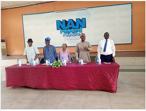 Prof. Victor Adefela with his wife and others during the book presentation, at NAN Media Centre in Iganmu, Lagos.