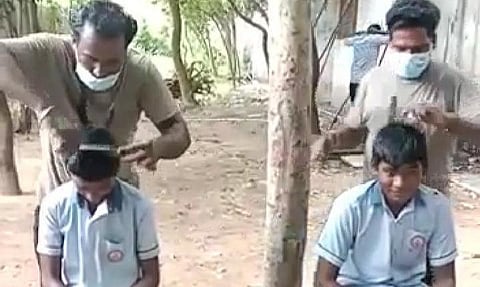 அபிஷேகப்பாக்கம் அரசு பள்ளியில் மாணவர்களுக்கு முடி திருத்தும் தொழிலாளர்கள்.