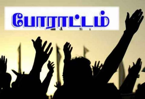 ஊட்டியில்  நடைபாதை வியாபாரிகள் கொட்டும் மழையில் போராட்டம்