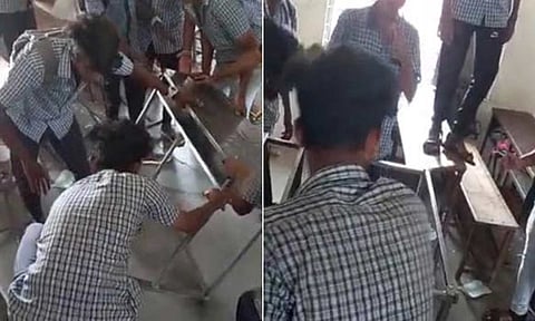 வகுப்பறையில் பெஞ்சை உடைக்கும் மாணவர்கள்