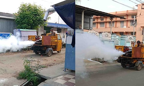 திருப்பூர் பகுதிகளில் கொசு மருந்து அடிக்கும் பணி நடைெபற்ற காட்சி.