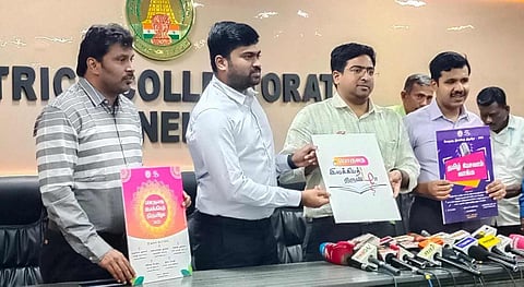 பொருநை இலக்கிய திருவிழா குறித்த லோகோவை கலெக்டர் விஷ்ணு வெளியிட்ட காட்சி. அருகில் மாநகராட்சி கமிஷனர் சிவ கிருஷ்ணமூர்த்தி, பயிற்சி உதவி கலெக்டர் கோகுல் ஆகியோர் உள்ளனர்.